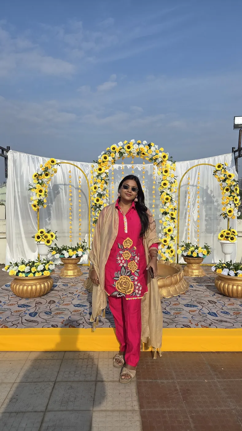 Hosting a rooftop Haldi in a pink kurta